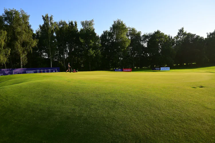 The ninth green and surrounds in the evening sunlight.