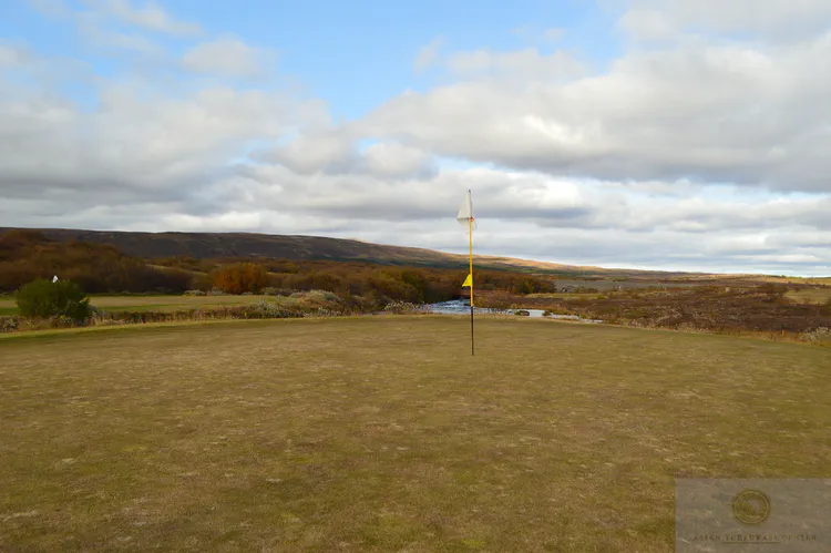 The river running through Geysir GC has no fish. The water is too cold, coming from a nearby glacier. The turf here is fine fescue (*Festuca rubra*). No irrigation is applied to this course, which allows the fescue to thrive and reduces the amount of *Poa annua*.