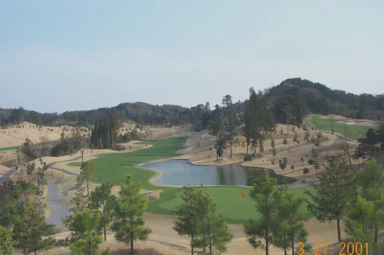 View from behind the 18th at Habu CC; hole 10 is on the right. We cored the greens that day.