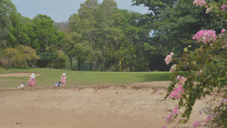 Bougainvillea abutting a bunker at the Royal Hua Hin GC