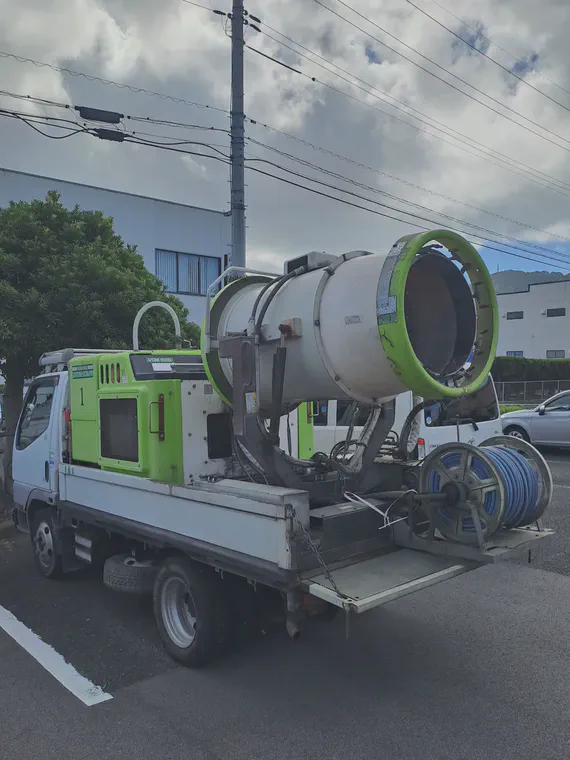 Spouter sprayer in the parking lot.