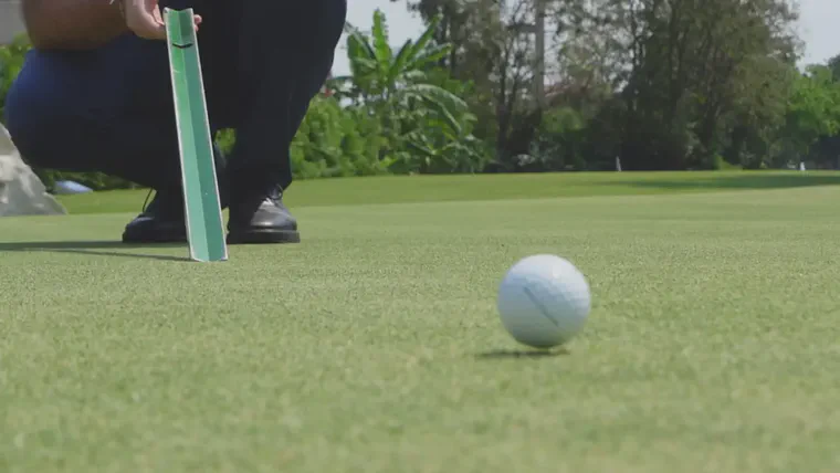 The ball bobbles (leaves the ground) during a roll from a stimpmeter on a zoysia green.